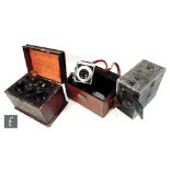 A Pixar Relex II camera with Tessar 1:35 10.5cm lens with slides in leather case, an early Kodak