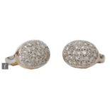 A pair of 18ct hallmarked oval stud earrings, each pave set with thirty brilliant cut stones,
