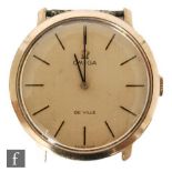 A gentleman's 9ct Omega De Ville manual wrist watch, batons to a circular champagne dial, movement