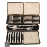 A set of Victorian silver plated fish servers with pierced and embossed decoration, a set of six Art