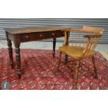 A Victorian mahogany two drawer side table on turned legs below a moulded edge top, height 72cm x