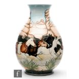 A Moorcroft Pottery Trial vase of baluster form decorated in the Stampede pattern by Paul