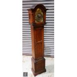 An early 20th Century oak cased Grandmother clock with a German 8-day movement striking on eight