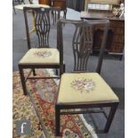 A set of six 20th Century Hepplewhite style mahogany dining chairs with pierced vase splats on