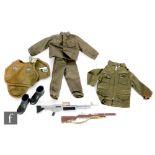 A collection of assorted Palitoy Action Man uniforms and accessories to include a partial Combat