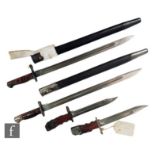 A 1907 pattern bayonet and scabbard, a 1913 English pattern bayonet and scabbard and two British