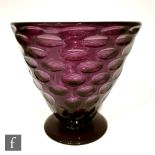 A 1930s Richardson glass vase of footed conical form, optic moulded with a spot design, all in a