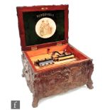 A Symphonion disc musical box playing 11 7/8 inch discs, duplex combs No 308738 in rococo style case