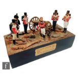 A light infantry 1808 diorama of six lead soldiers with canon on a naturalistic base representing