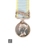 A Crimea Medal with Sebastopol bar to L. Williams Military Train. The Military Train was formed at