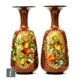 A pair of late 19th to early 20th Century Doulton Faience vases by Mary M Arding vases of shouldered