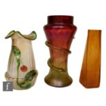 A collection of three early 20th Century Bohemian iridescent glass vases, comprising a Kralik vase
