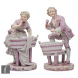 A pair of 19th Century French porcelain figures modelled as a lady and gentleman in period dress,