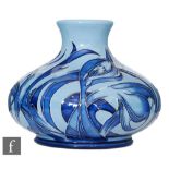 A Moorcroft Pottery Design Trial vase of compressed form decorated in a blue on blue stylised