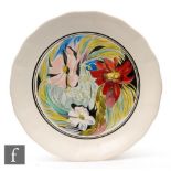 A Clarice Cliff Harrods Art in Industry Exhibition wave edge plate circa 1934 by M.J.Riach
