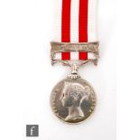 An Indian Mutiny Medal with Lucknow bar to B. Smith 34th Regiment.