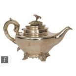 A George IV hallmarked silver teapot of circular form, the plain body engraved with a stag's head