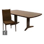 A 1970s 'Marwood' range Rio rosewood extending dining table of rounded rectangular form, designed by