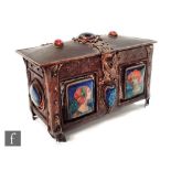 An Arts & Crafts copper and brass small rectangular casket detailed with two enamel portrait