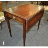 An American George III style mahogany Pembroke table with leather inset top, single end drawer, on