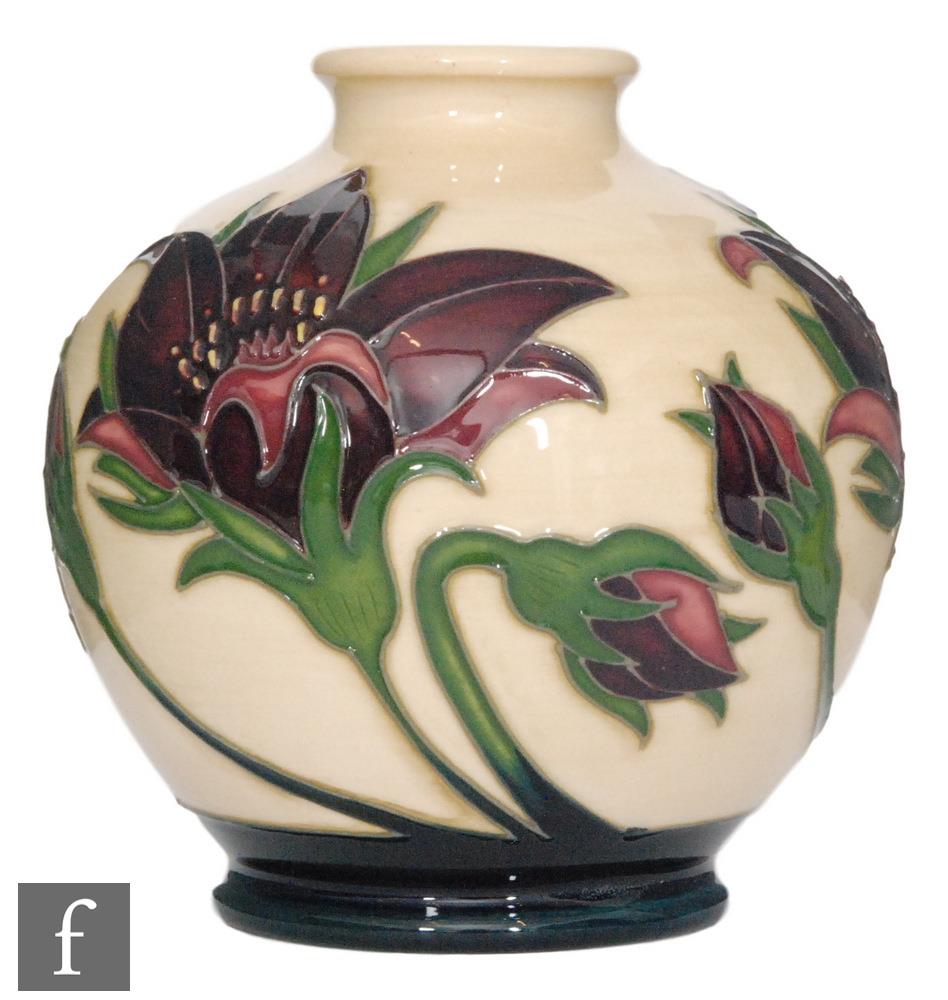 A Moorcroft Pottery vase of footed ovoid from decorated in the Pulsatilla pattern designed by