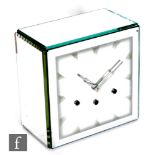 A 1930s Art Deco mantle clock of square section with mirrored case and acid etched dial, with key
