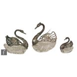 A set of three continental silver and clear glass bon bon dishes modelled as swans, clear cut