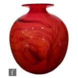 A contemporary studio glass vase by Anthony Stern, of spherical form with everted rim, decorated