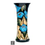 A Moorcroft Pottery Collectors Club vase of flared form decorated in the Blue Rhapsody pattern