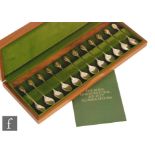 A cased set of twelve hallmarked silver tea spoons The Royal Horticultural Society Flower Spoons,