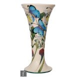 A Moorcroft Pottery vase of footed flared form from the Butterflies Collection, decorated with