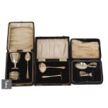 Two cased hallmarked silver children's feeding sets with pusher and spoon, Sheffield 1928 and