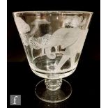 A large modern clear crystal footed goblet with knopped stem, hand engraved by John Everton with a