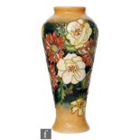 A Moorcroft Pottery Collectors Club vase decorated in the Victoriana pattern designed by Emma