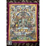 A Tibetan Thangka of Green Tara in her pure land in Mount Potala, pigment on cloth, depicting the