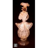 A 20th Century Murano glass figure of a dandy, the clear glass highlighted with gold and silver