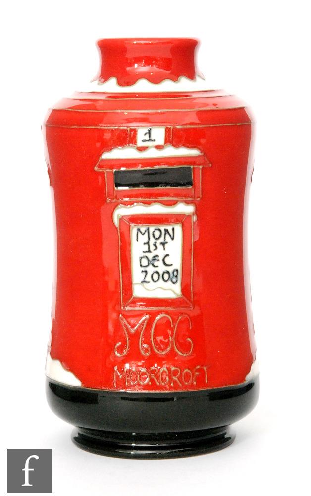 A Moorcroft Pottery Collectors Club vase in the Pillar Postbox pattern designed by Julie Ann
