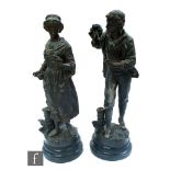 A pair of late 19th Century French spelter figures modeled as a male with his knapsack and a