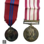 A Naval General service medal with Near East bar and ribbon and a coronation medal. (2)