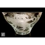 A modern clear glass bowl of flared circular form, engraved by John Everton with two views of a