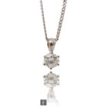 An 18ct white gold diamond solitaire pendant, brilliant claw set stone, weight approximately 1.03ct,