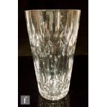 A 1950s Webb Corbett clear crystal vase of tumbler form, decorated with horizontal mitre lines and