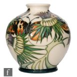 A Moorcroft Pottery vase of footed ovoid form decorated in the Northumberland pattern designed by