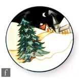 A Moorcroft Pottery pin dish coaster decorated in the New Moon at Christmas pattern designed by Sian