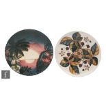 Two Moorcroft Pottery wall plates, the first decorated in the Birth of Light 'Millennium' pattern