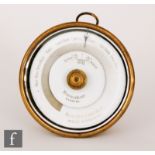 A 19th Century Biernatzki & Co Weather Compass of circular section with a white enamelled dial
