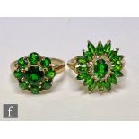 Two 9ct hallmarked diopside cluster rings one highlighted with eight diamonds, total weight 8.3g,