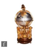 A Meridian globe mystery clock by St James House Company of London No 230/1500, the movement
