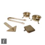 Four items of hallmarked silver a bookmark, a vesta case, a pair of sugar tongs and a pair of old