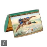 A hallmarked silver cushioned rectangular box with enamelled mallard in flight scene to hinged cover